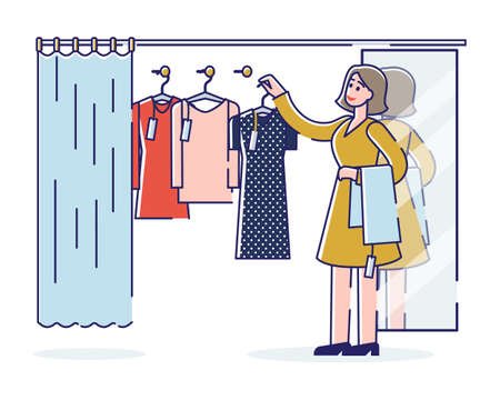 152289318-mujer-de-compras-eligiendo-ropa-en-perchas-para-probar-en-vestidor